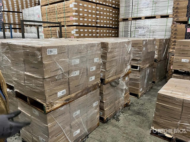 Stacked pallets of wholesale luxury vinyl plank and SPC flooring at Bryson Co LLC, Gadsden AL